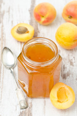 apricot confiture in a glass jar, top view