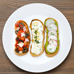 ciabatta with tomatoes, goat cheese, green peas pate and radish