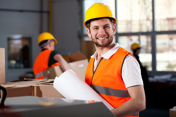 Smiling factory worker