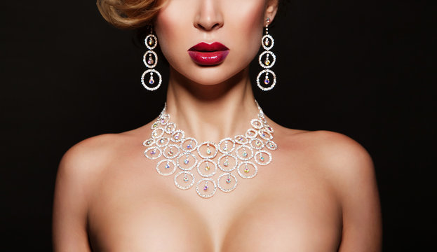 nude woman with luxury accessories. evening makeup. hot girl