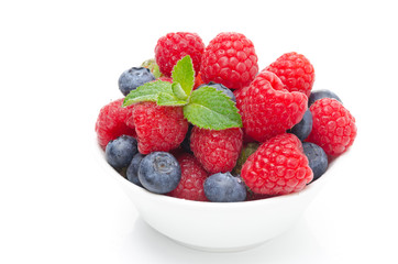 fresh berries (raspberries, blueberries, strawberries) in a bowl