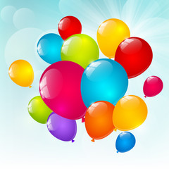 Color balloons on sunny background