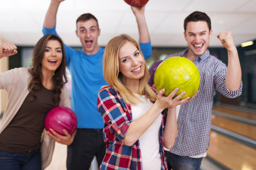 Group of young friend at the bowling alley