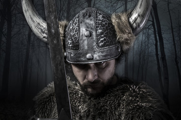Sword, Viking warrior with helmet over forest background