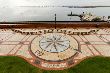 View of a stone pavement mosaic of a wind rose pattern.