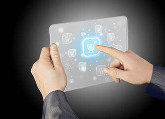 Businessman pushing shopping cart