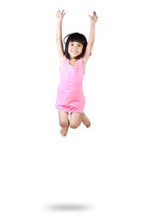 Adorable and happy little asian girl jumping in air