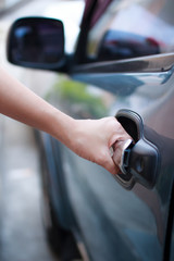 woman opening car