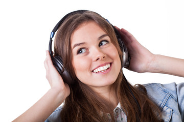 Fototapeta premium Teenage girl listening the music