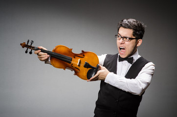 Funny violin player with fiddle