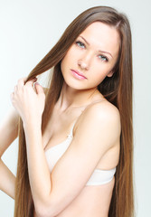 closeup portrait of a beautiful young woman with elegant long sh