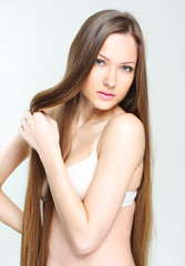 Naklejka premium closeup portrait of a beautiful young woman with elegant long sh
