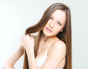 Obraz premium closeup portrait of a beautiful young woman with elegant long sh