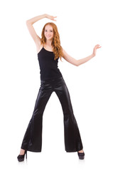 Redhead woman in black bell bottom pants on white