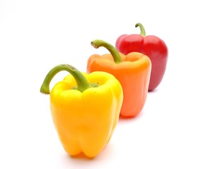 Colored Peppers Isolated On White Background