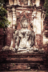 sculpture of Buddha at Wat Mahathat ruins. Ayutthaya, Thailand