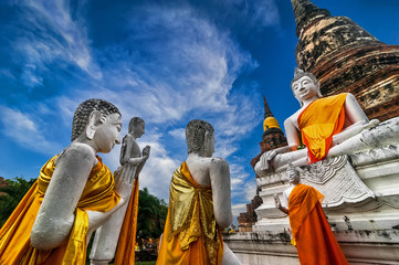 Buddhas at Wat Yai Chai Mongkhon temple. Ayutthaya, Thailand - obrazy, fototapety, plakaty