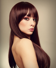 Beautiful woman with long hair. Art closeup portrait
