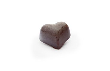black chocolate candy in the  shape of heart