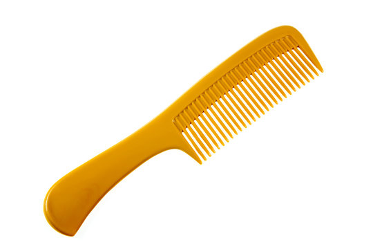 Yellow comb isolated on white background