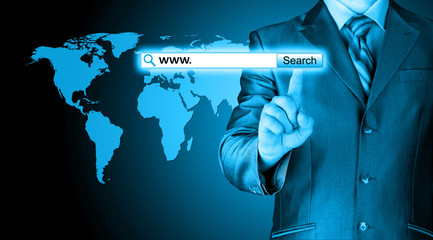 Businessman pushing virtual search bar