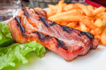 steak beef meat with tomato and french fries