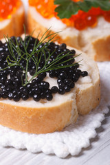 sandwiches with black and red caviar vertical