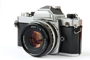 Vintage SLR camera - Powered by Adobe