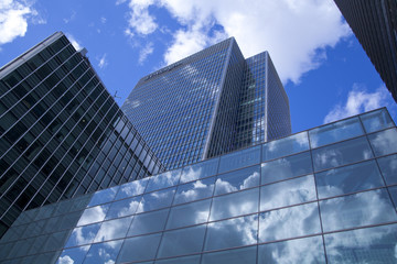 Fototapeta na wymiar LONDON, UK - CANARY WHARF, MARCH 22, 2014: Modern glass building