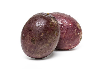  passion fruits isolated on a white background.