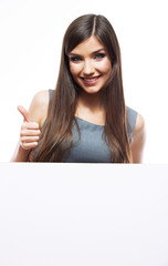 Fototapeta premium Smiling woman leaning on big blank board .