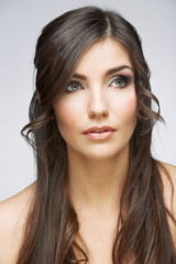 Beauty style face portrait of young woman looking side.
