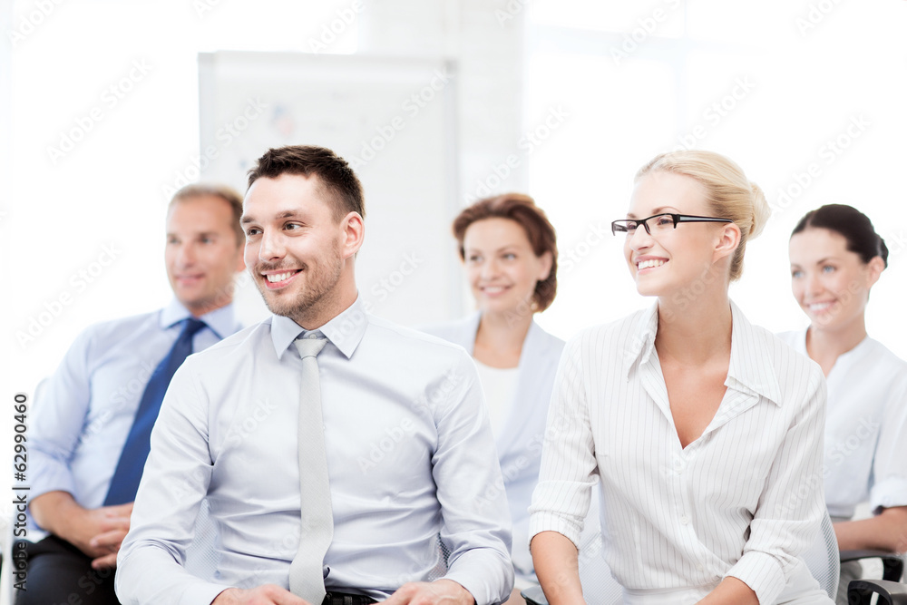 Poster businessmen and businesswomen on conference