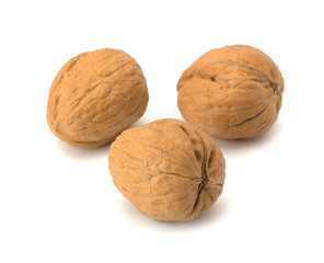 whole and cracked walnut isolated on the white background