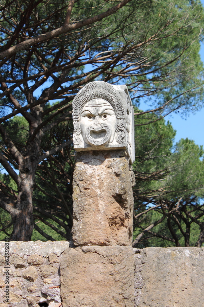 Wall mural Satiric mask in Ostia Antica, Italy