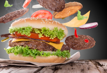 delicious hamburger on wood