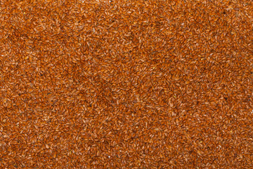 Close up flaxseed linseed brown red food background texture