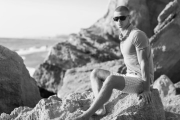 Vibrant fashion portrait of a sexy muscular fit man