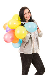 Fototapeta premium Happy woman with balloons on her shoulder