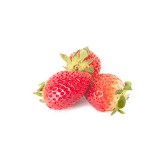 Three strawberries isolated over white