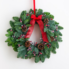 Advent wreath with red ribbon