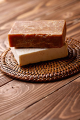 Handmade soap over wooden background 