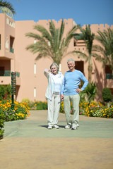 Fototapeta na wymiar Senior couple at hotel resort