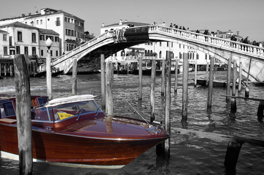 Water taxi by Rialto Bridge in Venice