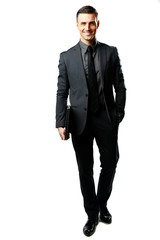 Fototapeta premium Full-length portrait of a businessman standing 