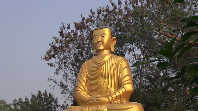 golden big  lord Buddha statue in Lumbini, Nepal