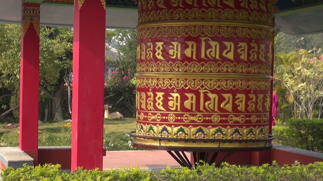 beautiful ornamental buddhist prayer wheel in Lumbini, Nepal