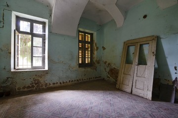 old abandoned room with windows