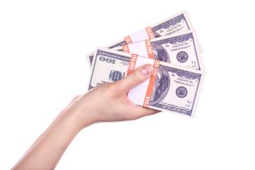 big packs of dollars in hand isolated on a white background
