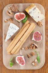 Cheese board with figs and nuts
